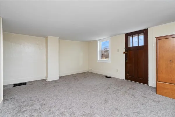 an empty room with windows