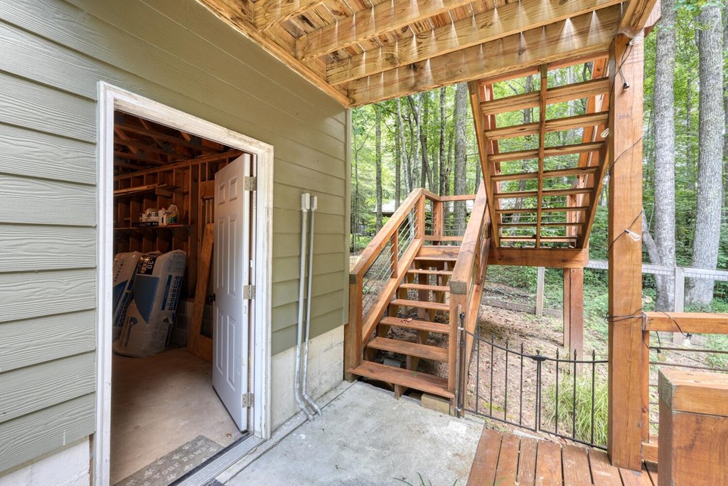 550 Watson Road Epworth, GA 30541 - Photo 41 of 63 a view of a balcony with stairs and furniture