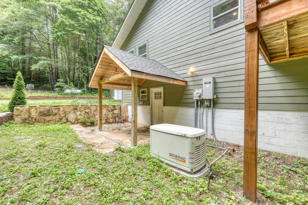 550 Watson Road Epworth, GA 30541 - Photo 7 of 63 a view of a backyard with a garden and patio