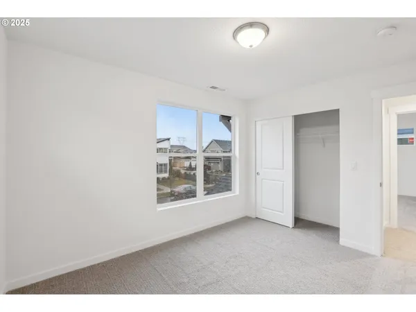 a view of a room that has a window in it