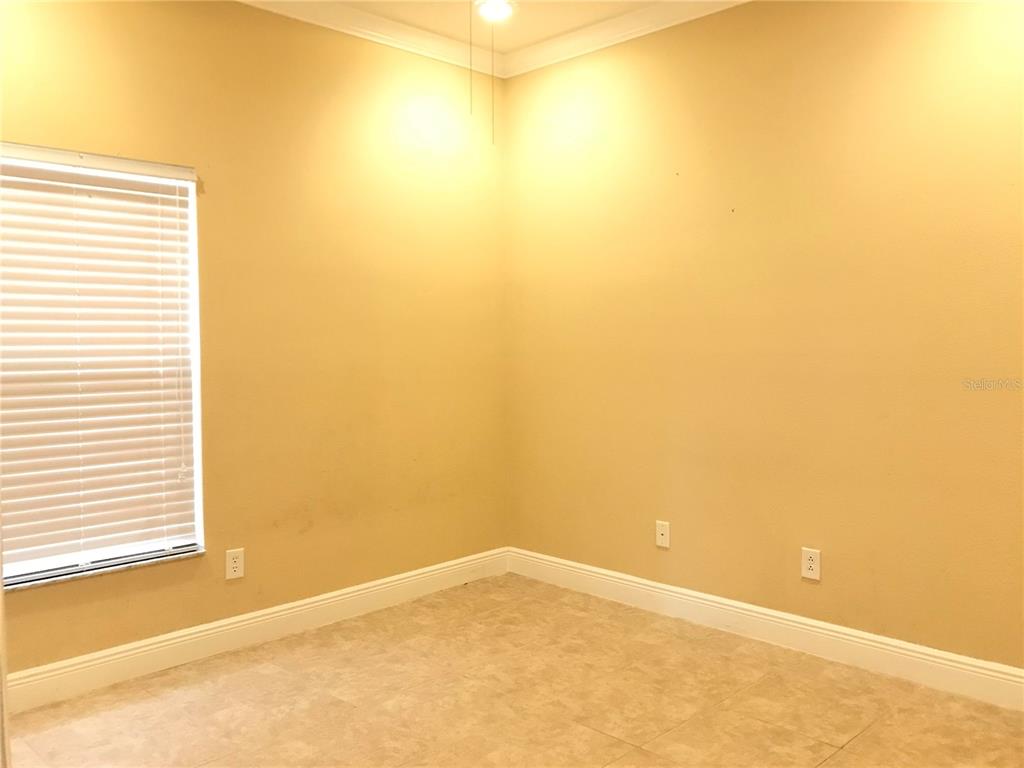10505 Willow Ridge Loop Orlando, FL 32825 - Photo 22 of 45 a view of a room with a window
