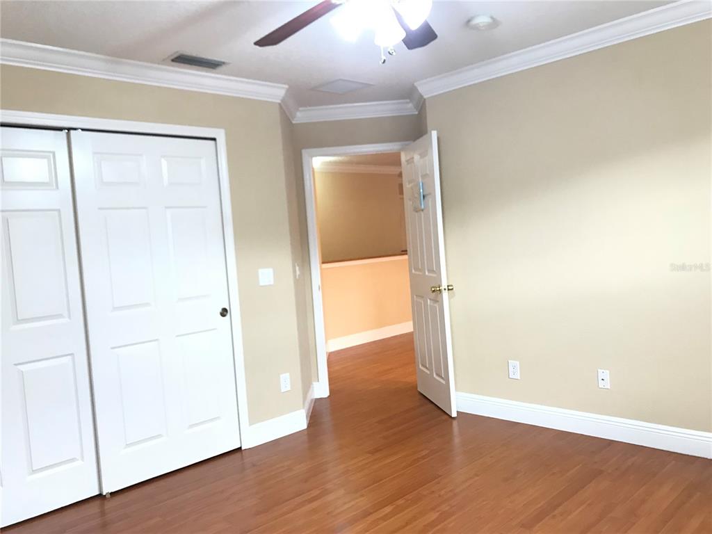 10505 Willow Ridge Loop Orlando, FL 32825 - Photo 35 of 45 wooden floor in an empty room