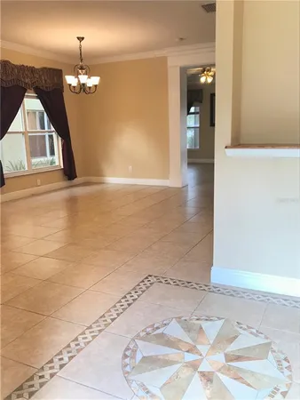 a view of a livingroom with wooden floor