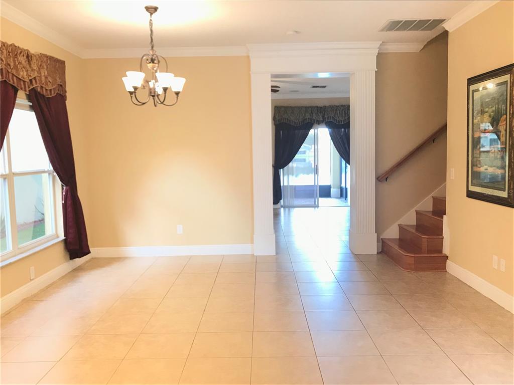 10505 Willow Ridge Loop Orlando, FL 32825 - Photo 5 of 45 a view interior of the house and chandelier