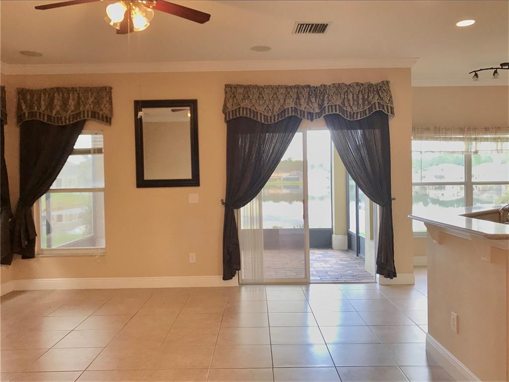 10505 Willow Ridge Loop Orlando, FL 32825 - Photo 10 of 45 a view of an entryway with wooden floor