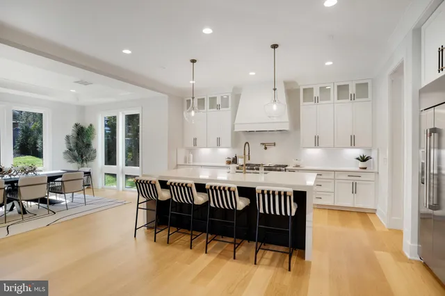 a swimming pool with outdoor seating and yard