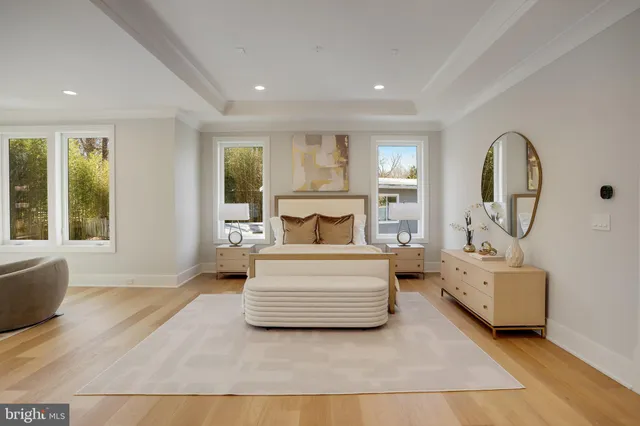 a view of a livingroom with furniture and hardwood floor