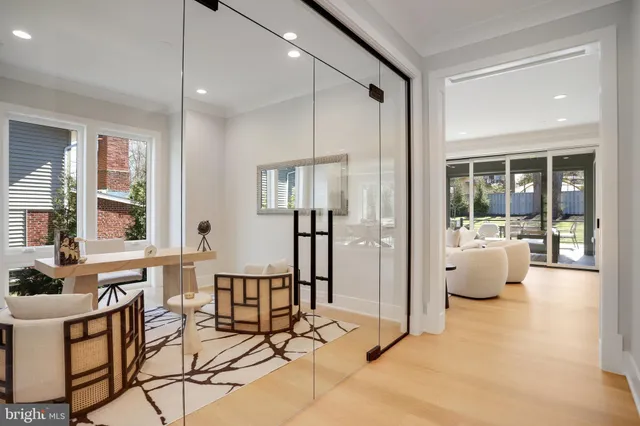 a kitchen with stainless steel appliances granite countertop a sink a stove and cabinets