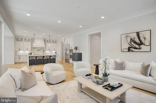 a view of a chairs and table on the wooden floor