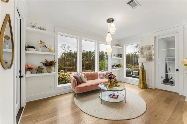 a bed room with a bed and a mirror