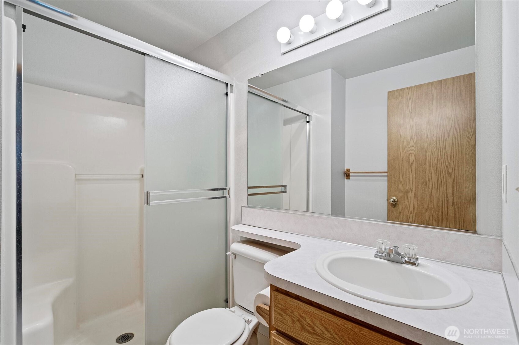 106 Rose Marie Drive Chehalis, WA 98532 - Photo 12 of 25 a bathroom with a sink toilet and shower