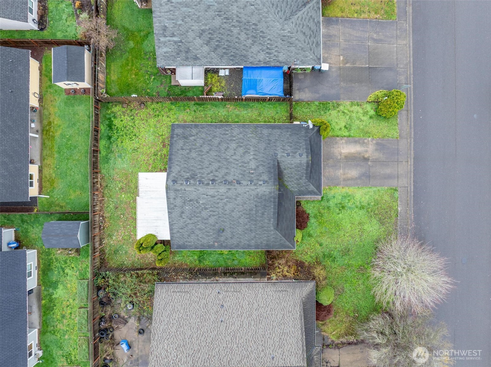 106 Rose Marie Drive Chehalis, WA 98532 - Photo 23 of 25 a stone house with a yard and a outdoor space