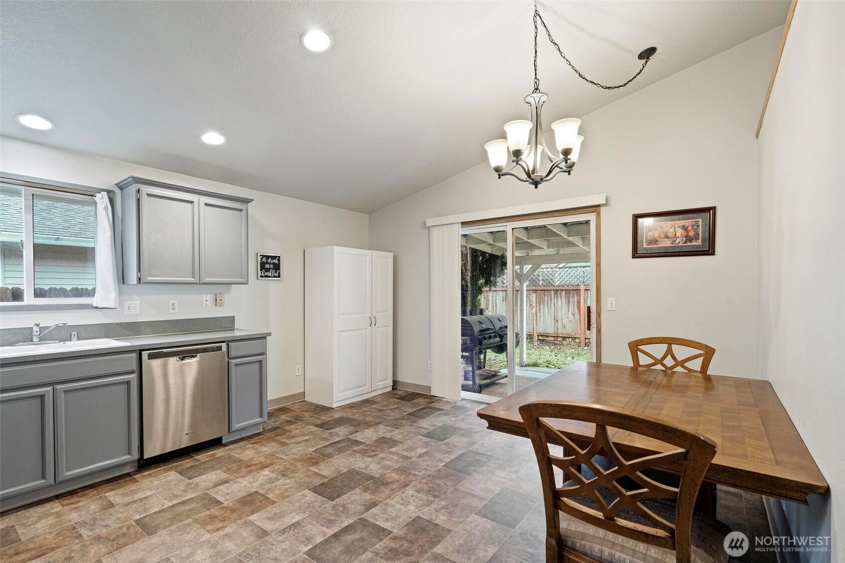 106 Rose Marie Drive Chehalis, WA 98532 - Photo 6 of 25 a view of a dining room with furniture window and wooden floor