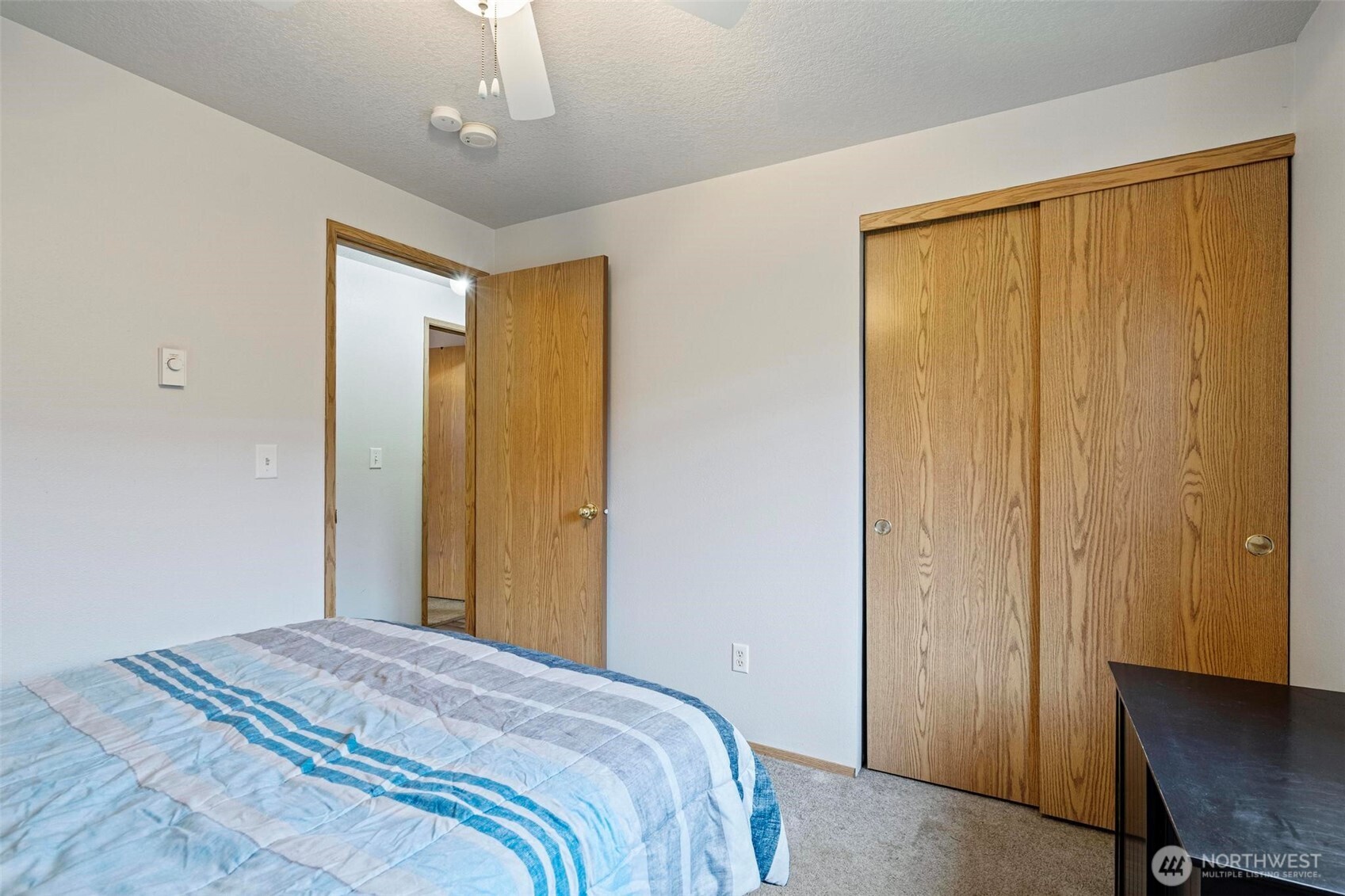 106 Rose Marie Drive Chehalis, WA 98532 - Photo 10 of 25 a bedroom with a bed and a window