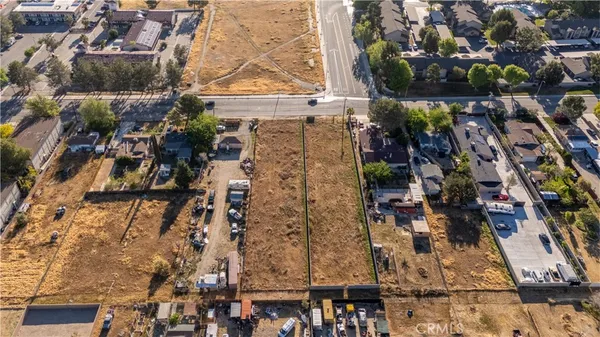 a aerial view of a house with a yard