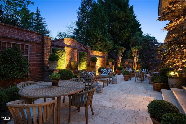 a view of a tables and chairs in patio