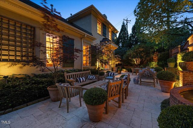 a view of a chairs and tables in the patio