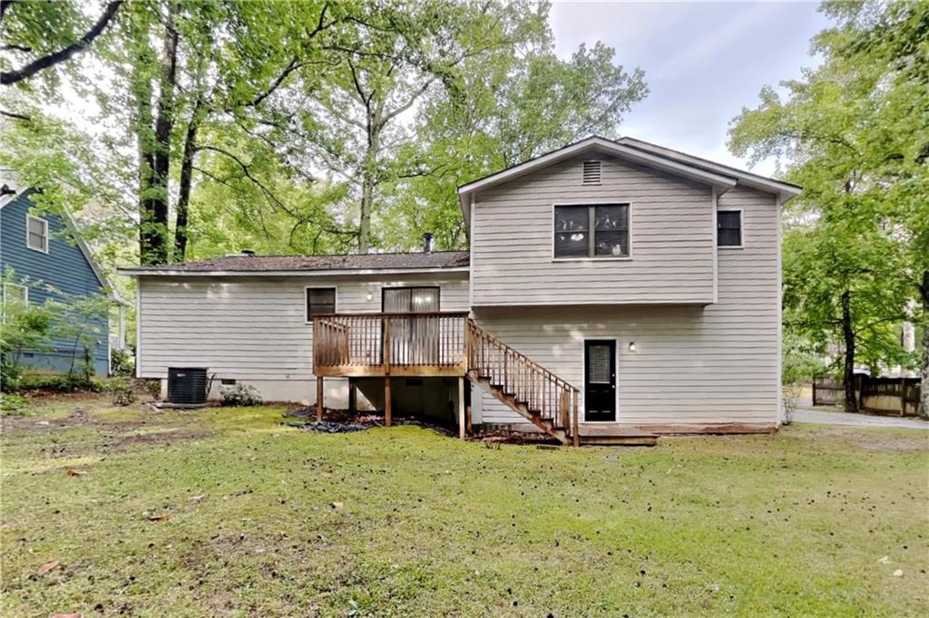 464 Ridgemont Drive Lawrenceville, GA 30046 - Photo 19 of 22 a view of a house with a yard