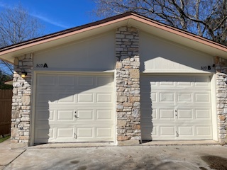 809 Plumpton Drive Austin, TX 78745 - Photo 2 of 14 Garage with driveway
