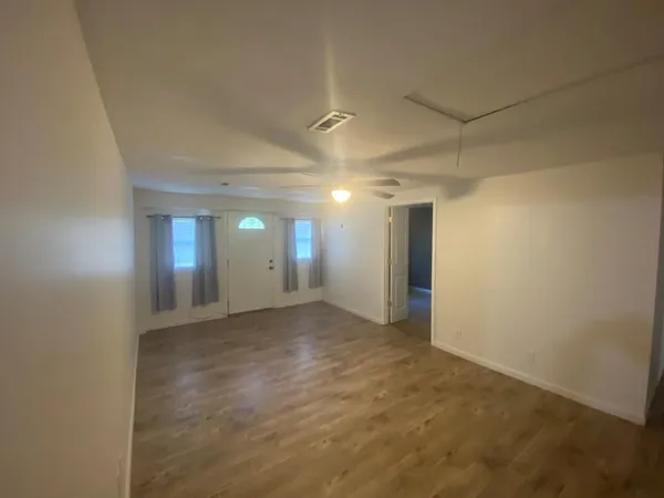 a view of an empty room and window