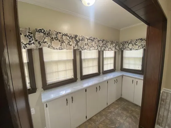 a bathroom with a double vanity sink and mirror