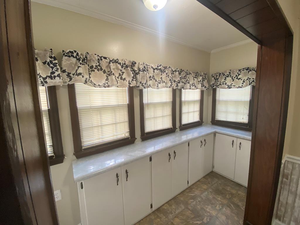 12165 Warm Springs Road Ellerslie, GA 31807 - Photo 7 of 15 a bathroom with a double vanity sink and mirror