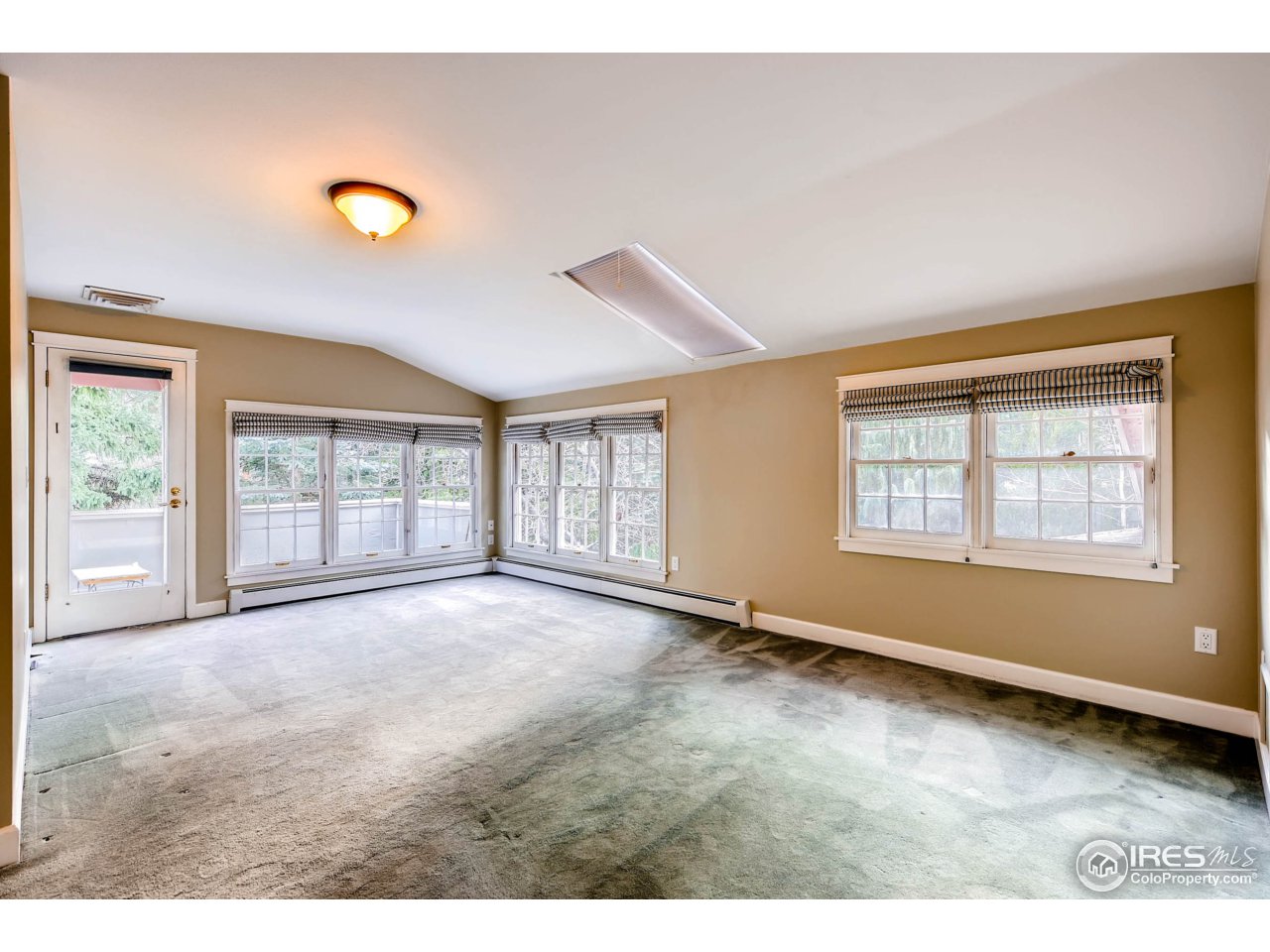 3555 4th Street Boulder, CO 80304 - Photo 12 of 30 an empty room with windows