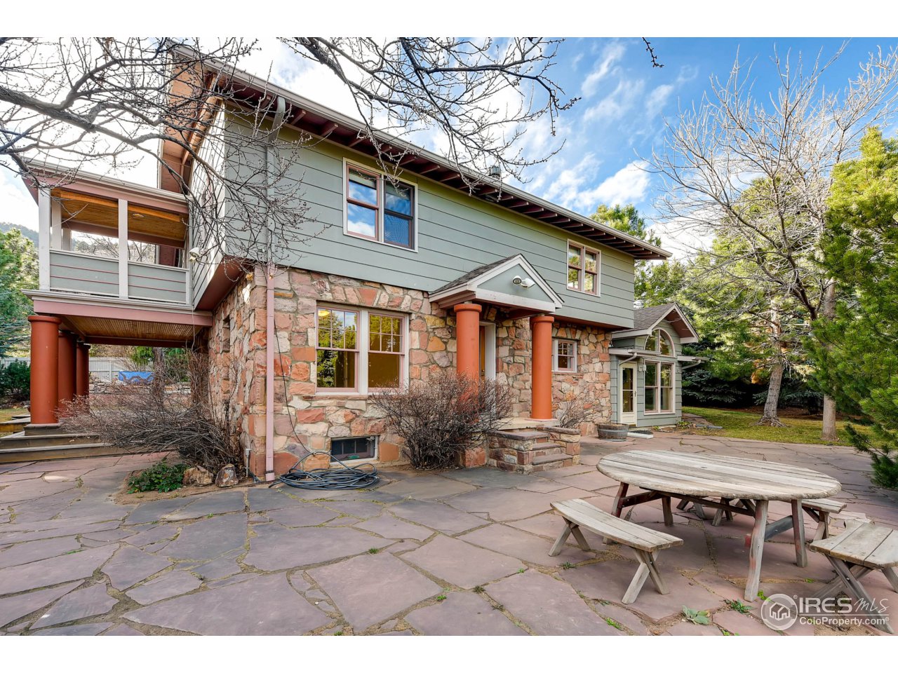 3555 4th Street Boulder, CO 80304 - Photo 3 of 30 a backyard of a house with outdoor seating