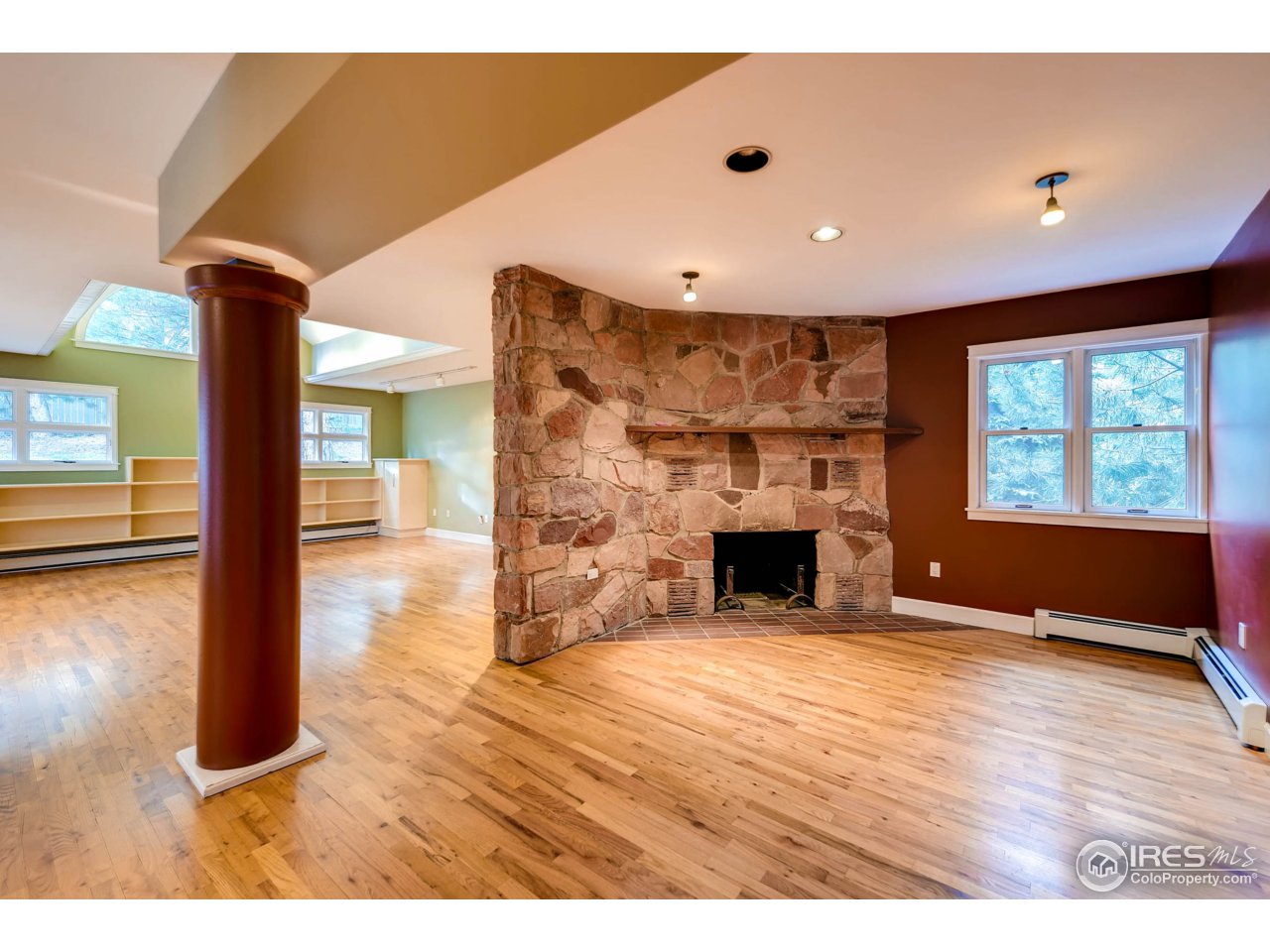 3555 4th Street Boulder, CO 80304 - Photo 10 of 30 a view of a livingroom with an empty space and a fireplace