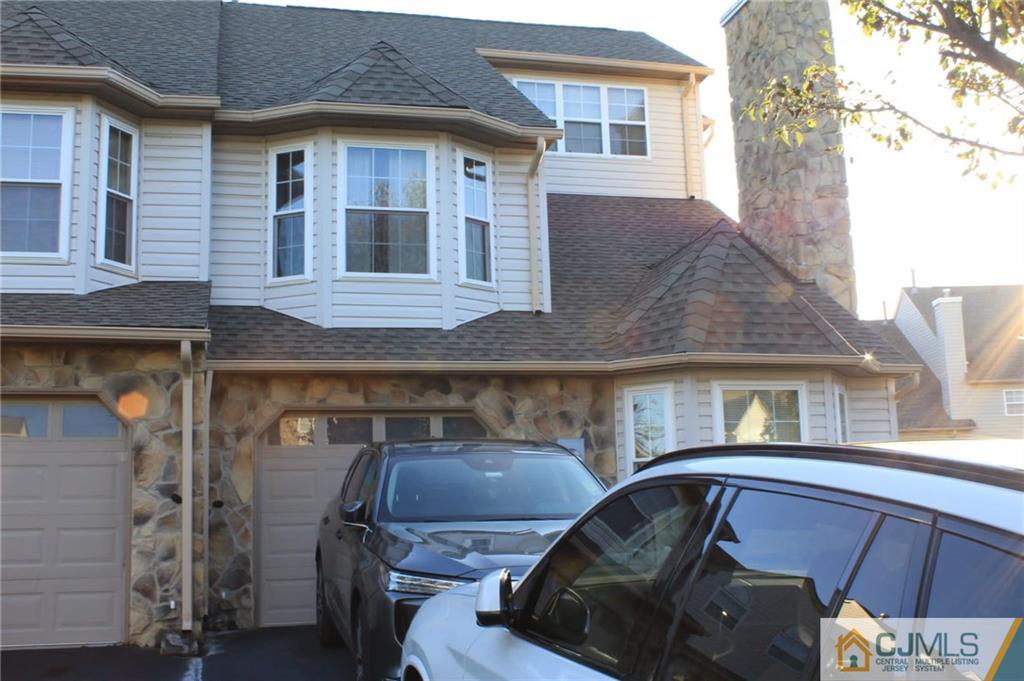 347 Lunar Road, Unit 347 Piscataway, NJ 08854 - Photo 3 of 4 a front view of a house with parking space