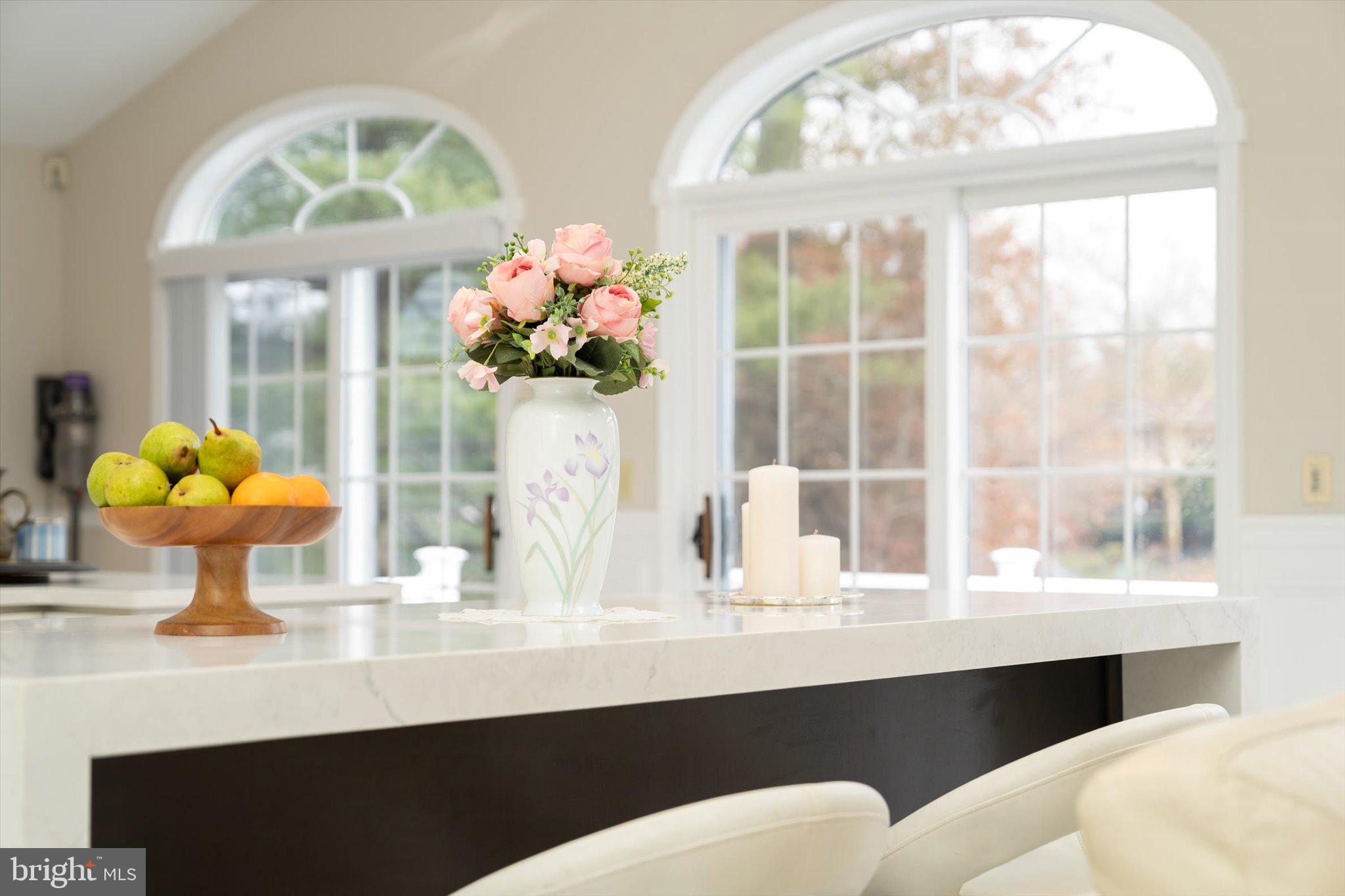 93 Tudor Drive Hamilton, NJ 08690 - Photo 19 of 67 a view of a dining room with furniture and a chandelier