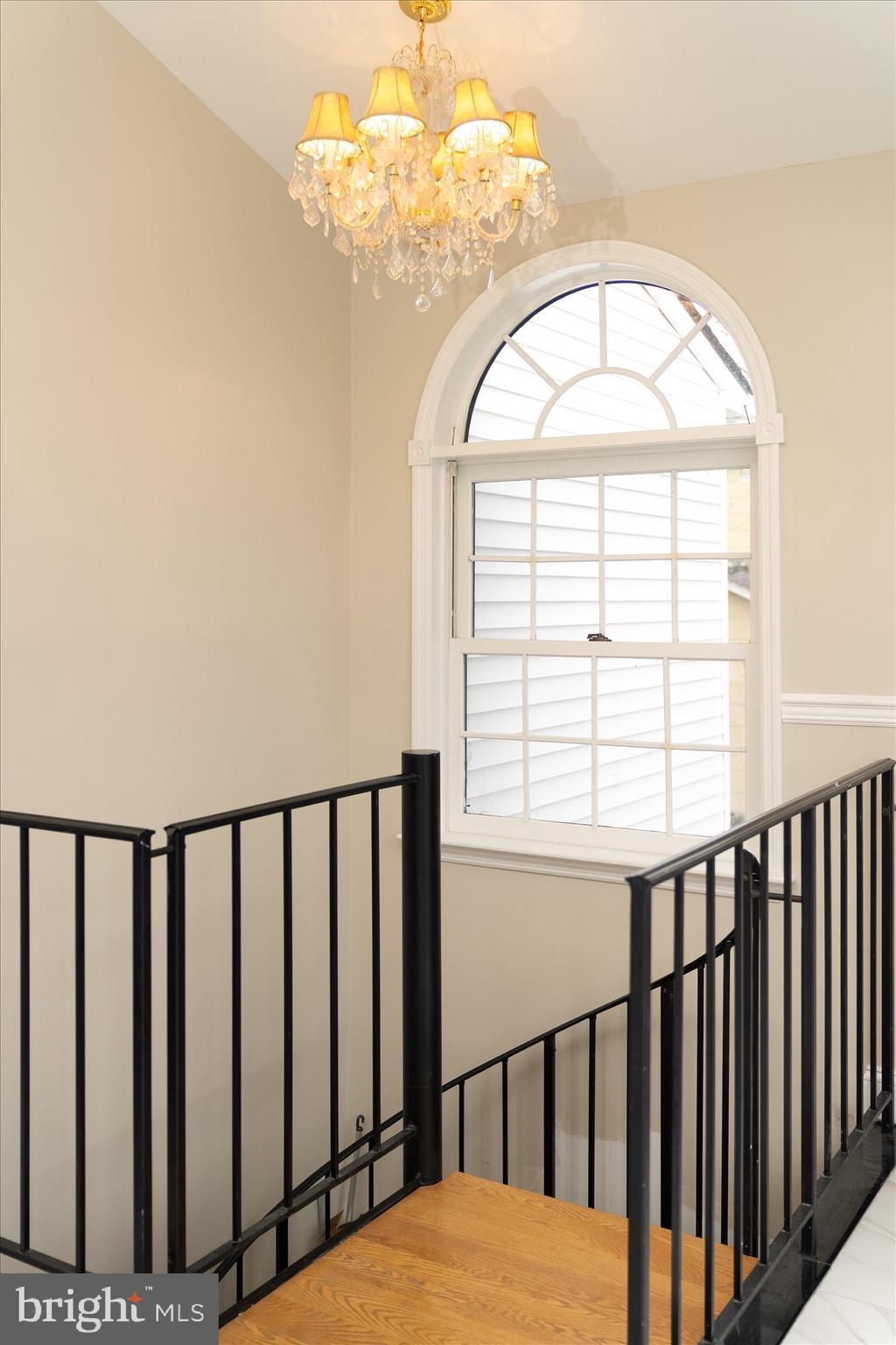 93 Tudor Drive Hamilton, NJ 08690 - Photo 29 of 67 a view of staircase with wooden floor