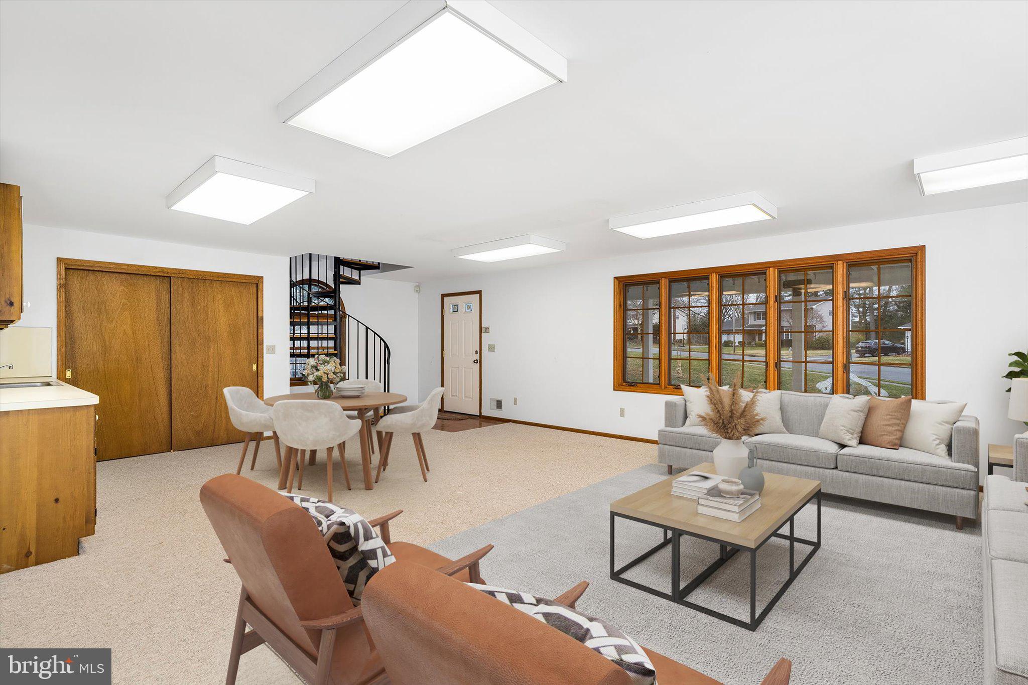 93 Tudor Drive Hamilton, NJ 08690 - Photo 50 of 67 a living room with furniture and a large window