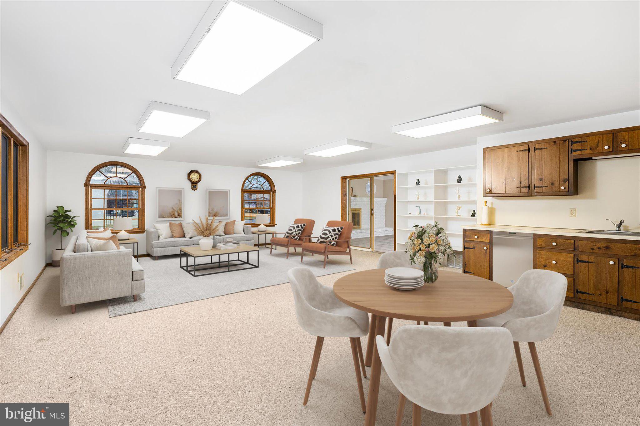 93 Tudor Drive Hamilton, NJ 08690 - Photo 52 of 67 a view of a dining room with furniture and a large window