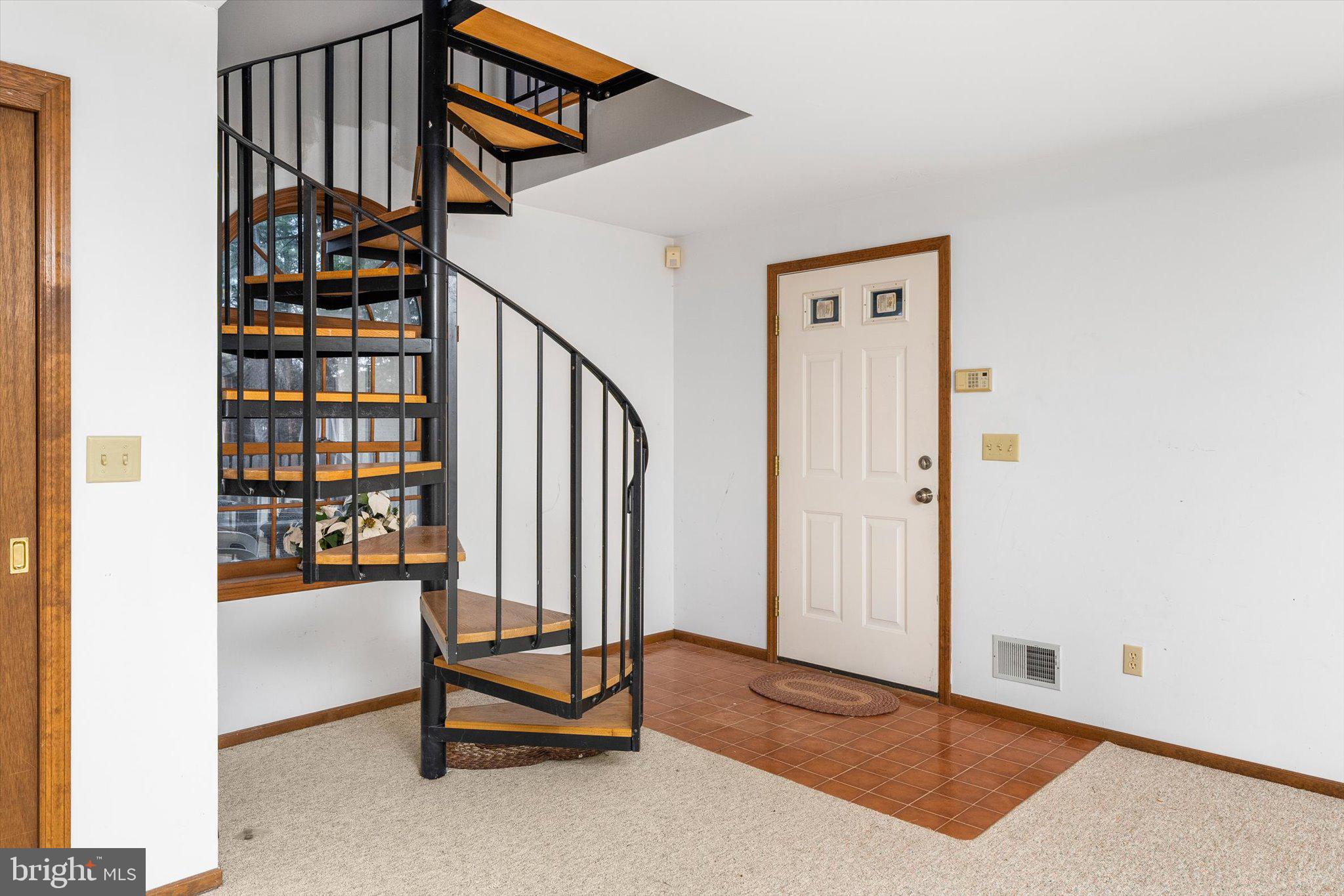 93 Tudor Drive Hamilton, NJ 08690 - Photo 53 of 67 a view of an entryway with wooden floor