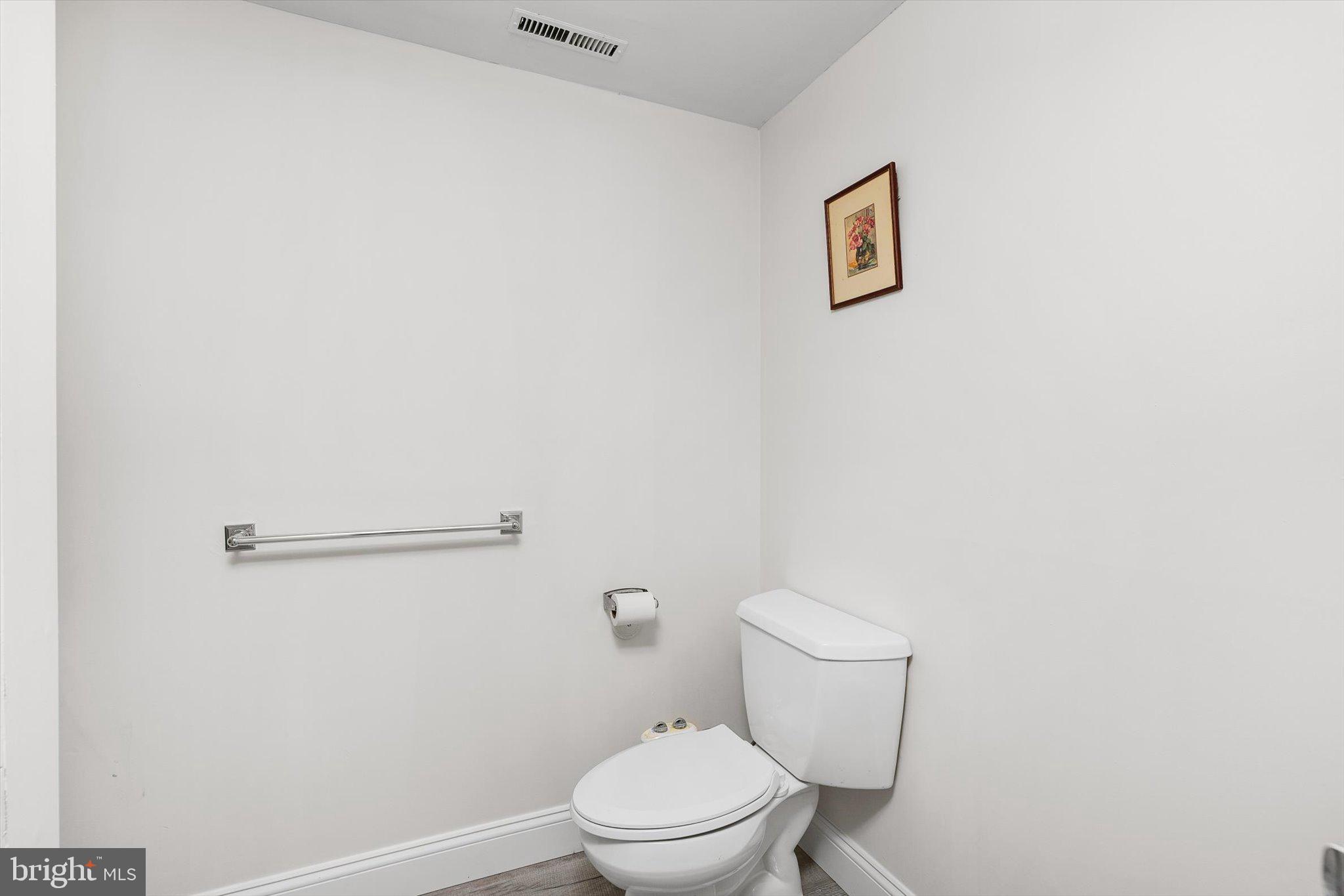 93 Tudor Drive Hamilton, NJ 08690 - Photo 55 of 67 a white toilet sitting next to a shower
