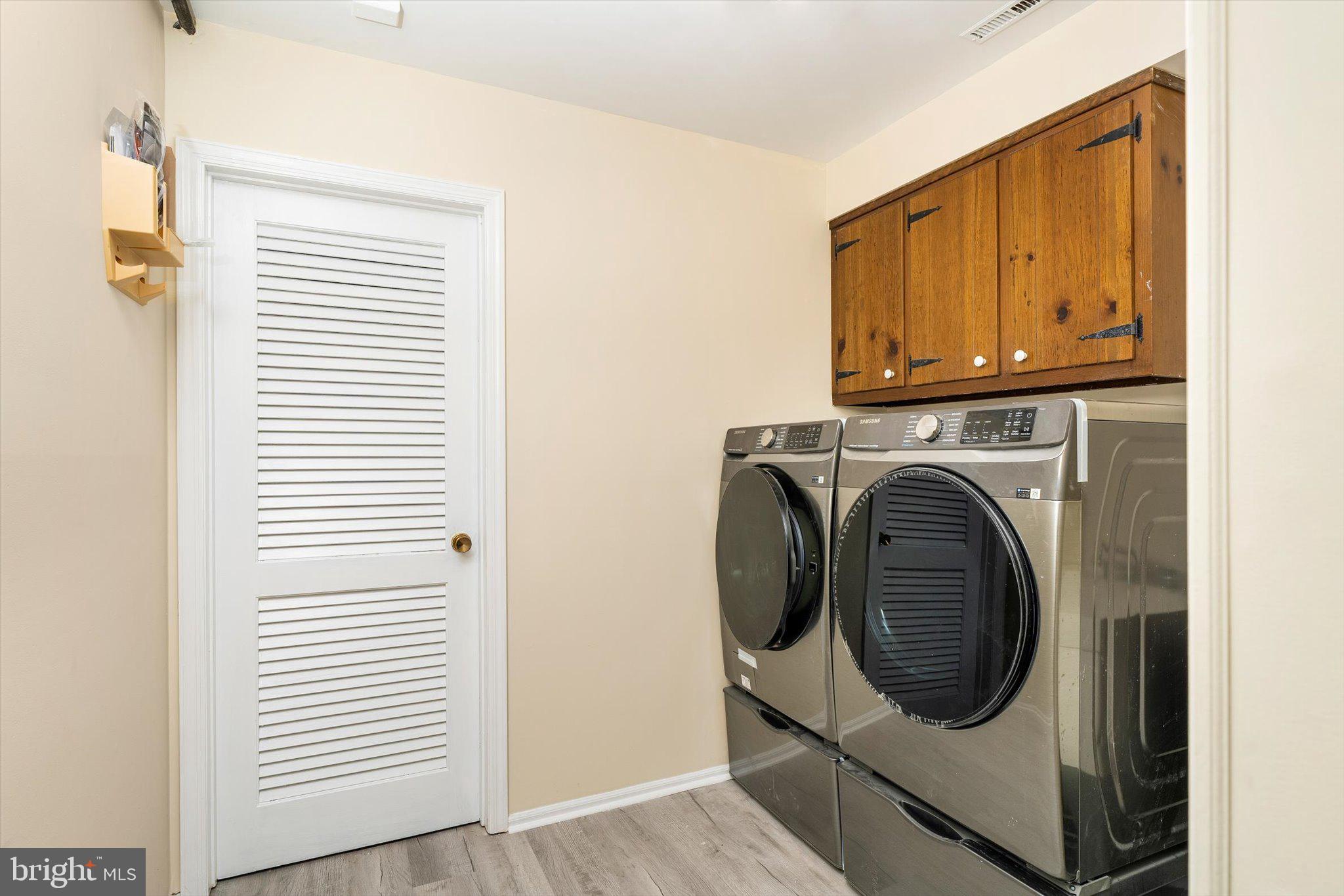 93 Tudor Drive Hamilton, NJ 08690 - Photo 56 of 67 a utility room with dryer and washer