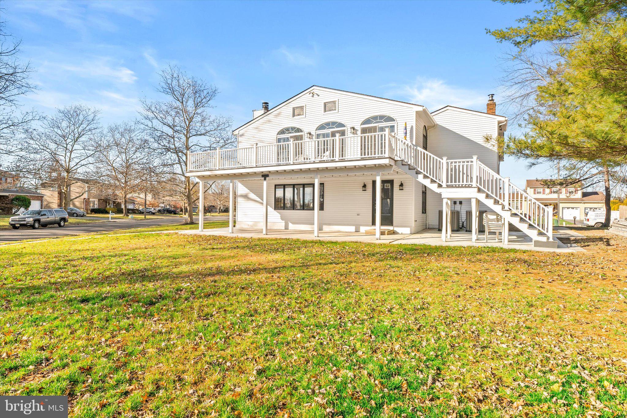 93 Tudor Drive Hamilton, NJ 08690 - Photo 59 of 67 a large white building with a white roof