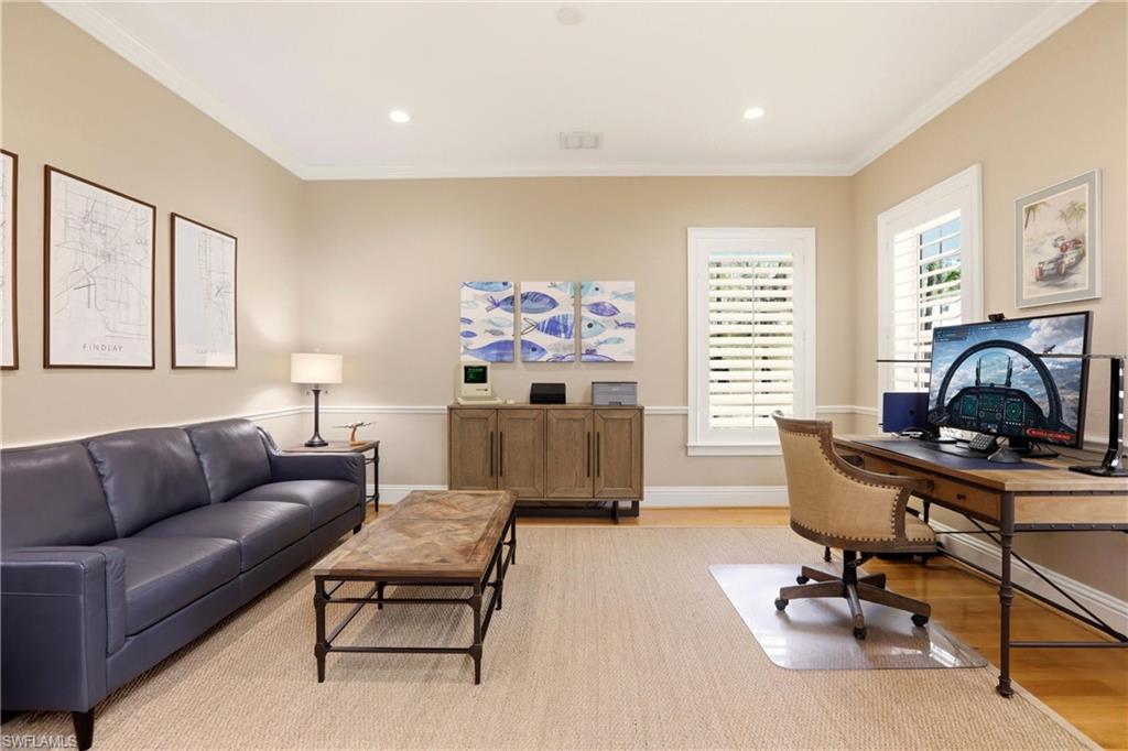 4335 7th Avenue Southwest Naples, FL 34119 - Photo 17 of 49 Office area with light wood-type flooring, ornamental molding, and recessed lighting