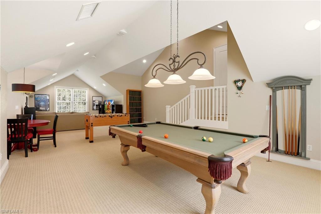 4335 7th Avenue Southwest Naples, FL 34119 - Photo 25 of 49 Rec room with billiards table, light colored carpet, lofted ceiling, and recessed lighting