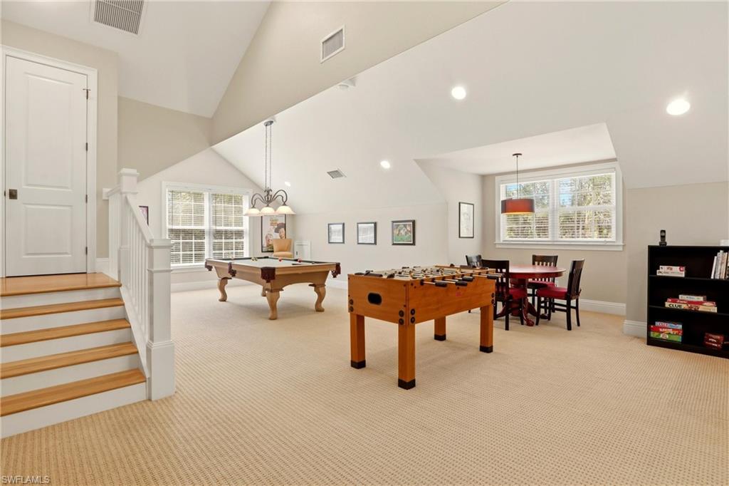 4335 7th Avenue Southwest Naples, FL 34119 - Photo 26 of 49 Rec room with light carpet, vaulted ceiling, and pool table