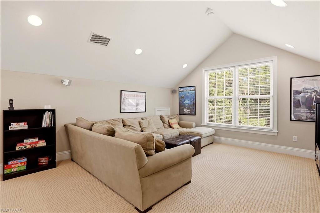 4335 7th Avenue Southwest Naples, FL 34119 - Photo 27 of 49 Living area with light colored carpet and recessed lighting