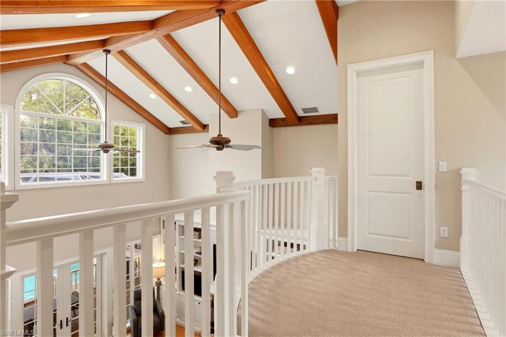 4335 7th Avenue Southwest Naples, FL 34119 - Photo 33 of 49 Hallway with recessed lighting, carpet, and beamed ceiling