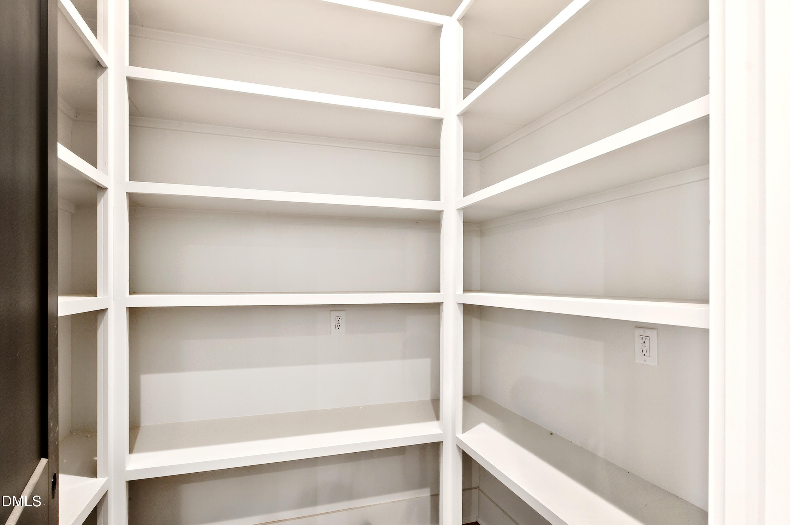 909 Oberlin Road Raleigh, NC 27605 - Photo 16 of 59 a view of an empty walk in closet