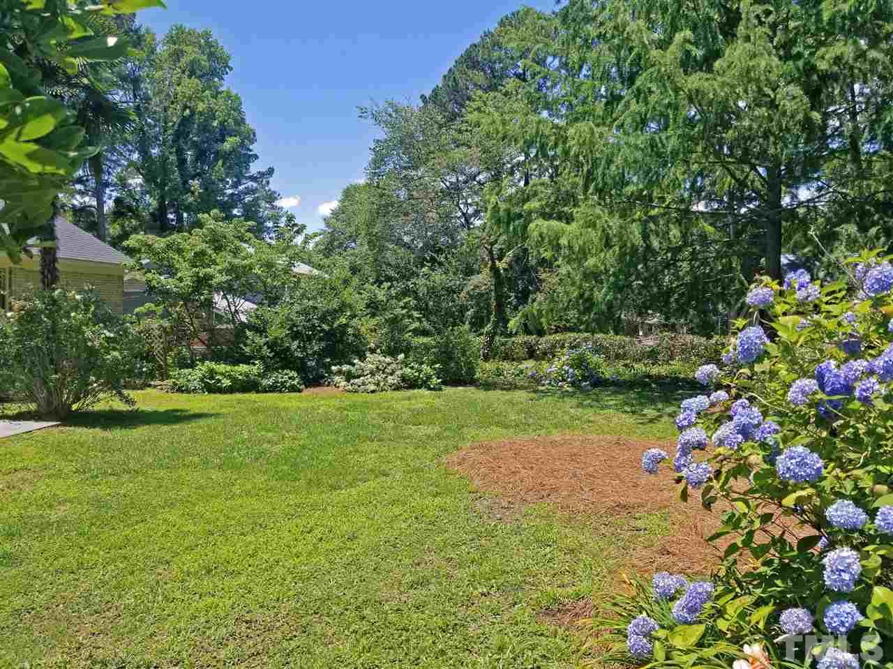 1324 Kingston Ridge Road Cary, NC 27511 - Photo 27 of 30 Hydrangeas and day lilies are two of the flowering species you will find in this lovely backyard.