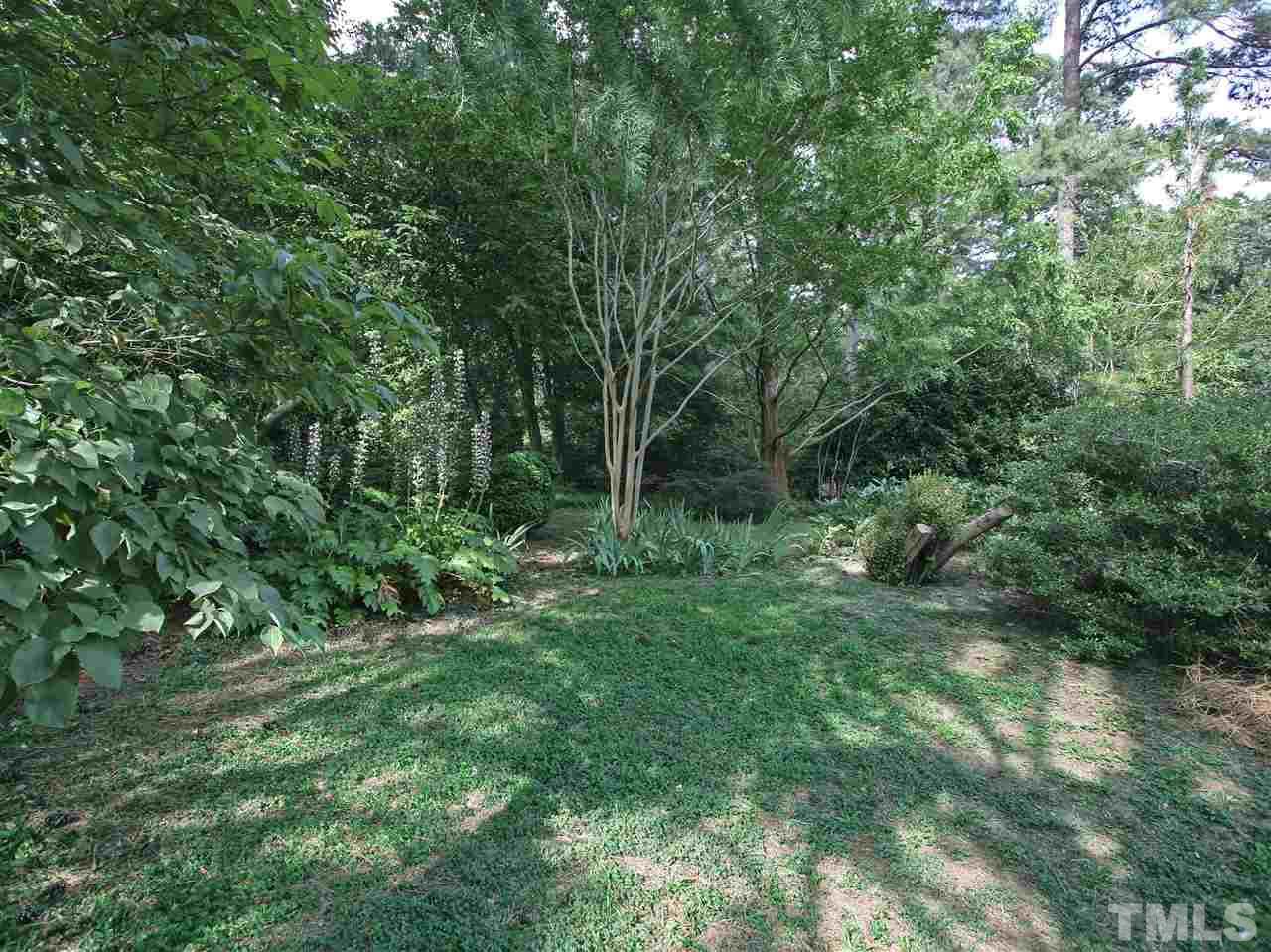 1324 Kingston Ridge Road Cary, NC 27511 - Photo 29 of 30 The shed is a great place to store your gardening tools.