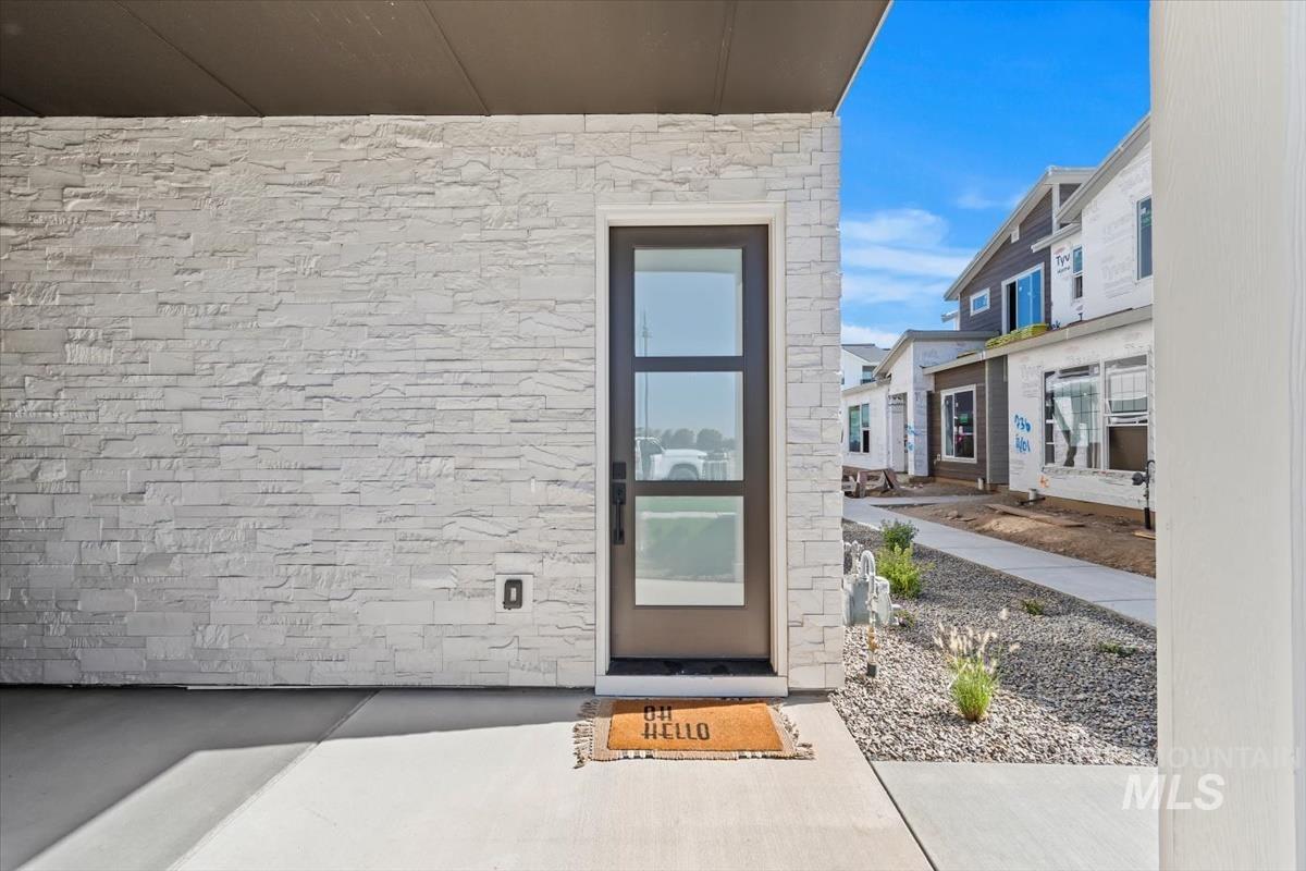 720 South Calhoun Place Star, ID 83669 - Photo 2 of 43 View of exterior entry with stone siding
