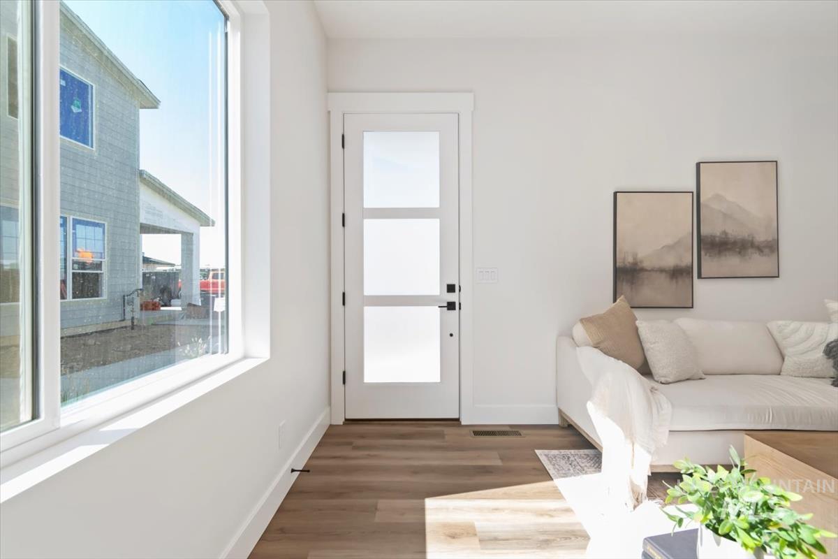 720 South Calhoun Place Star, ID 83669 - Photo 5 of 43 Living area with wood finished floors and baseboards