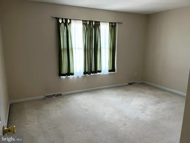 an empty room with window