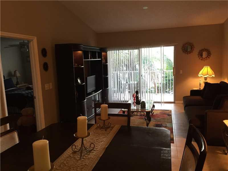 5061 Wiles Road, Unit 201 Pompano Beach, FL 33073 - Photo 1 of 18 Living Room